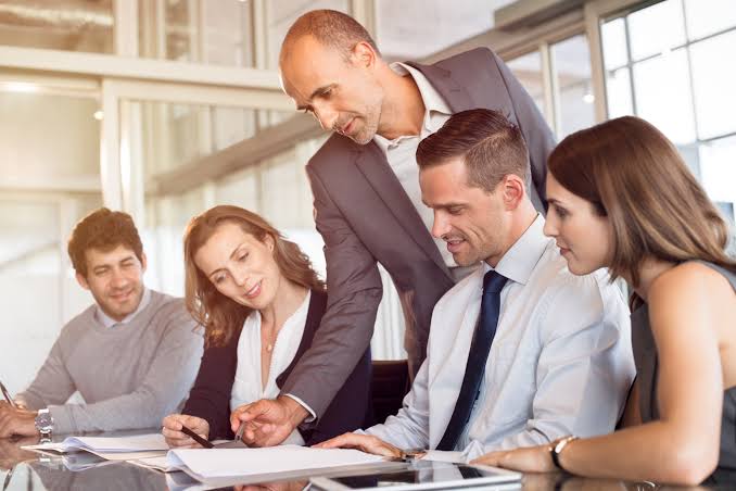 Team reviewing business growth data